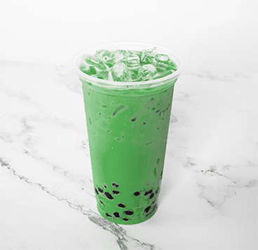 photo of green jasmine boba tea drink over ice